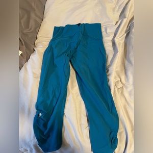 Workout clothing for girls.Iviva leggings and a criss-cross open back